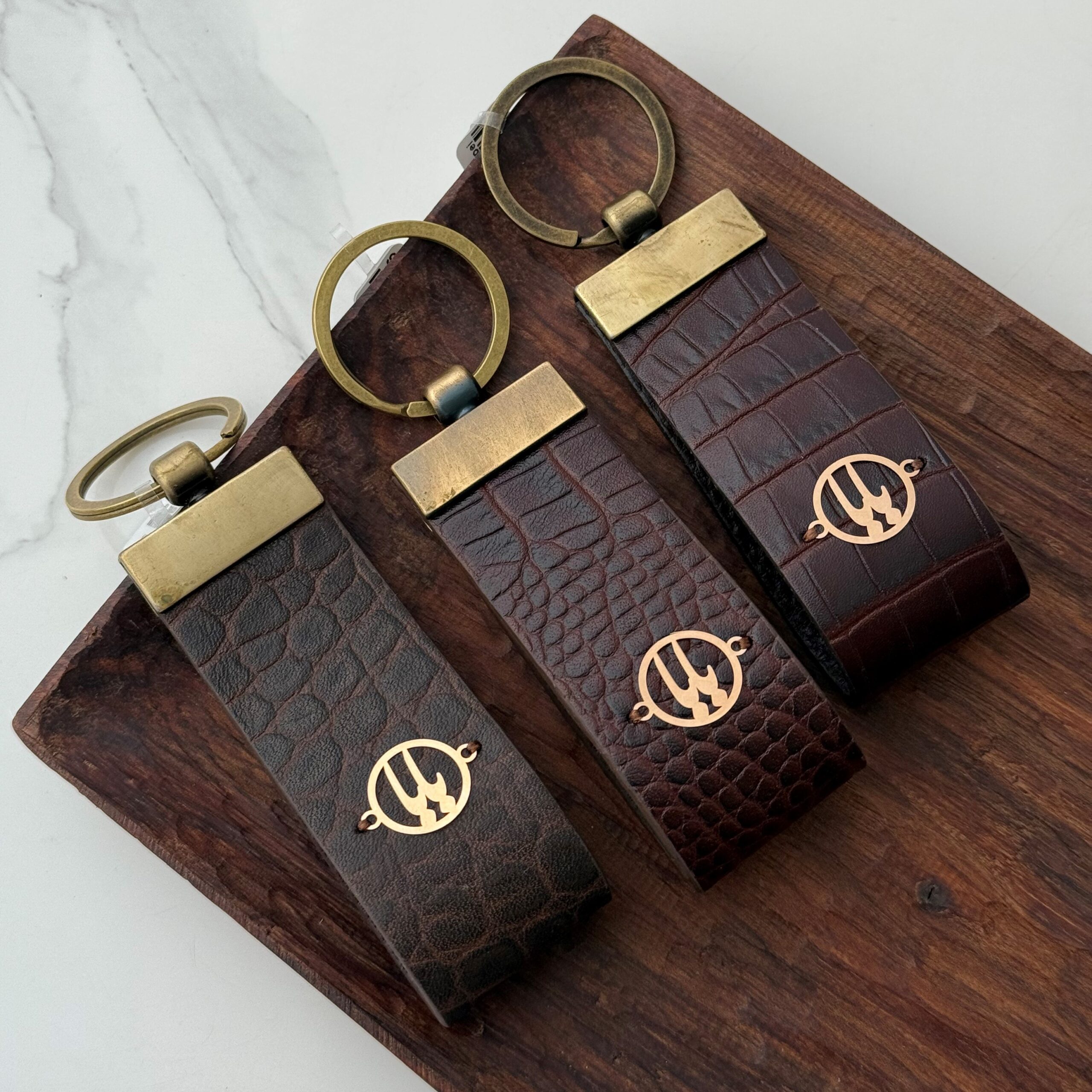 IMG_7064 جاسوئیچی چرم و طلا بابا - Image 1