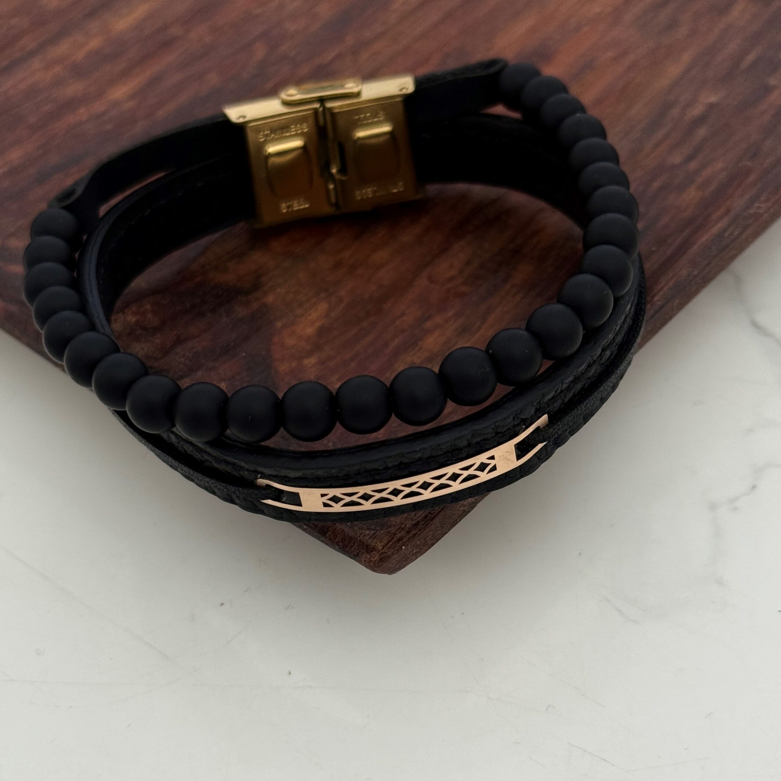 IMG_9392 دستبند چرم و طلا مهره دار کد 4016 - Image 1