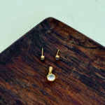 نیمست طلا تک نگین گرد