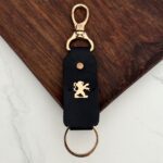 جاسوئیچی چرم و طلا طرح پژو