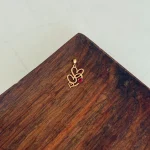 پلاک طلا سه قلب تک نگین